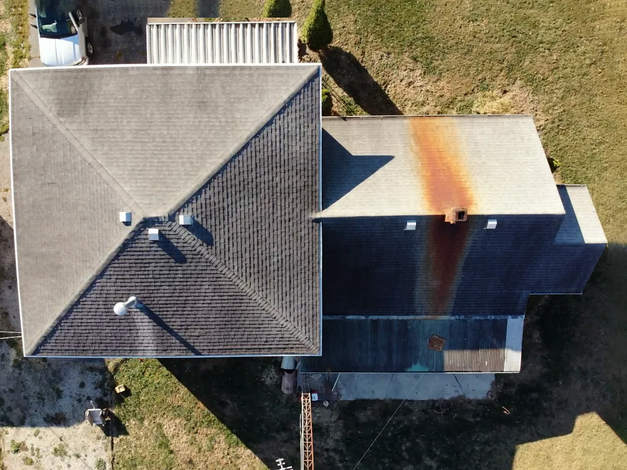 Chimney damage to shingle roof.