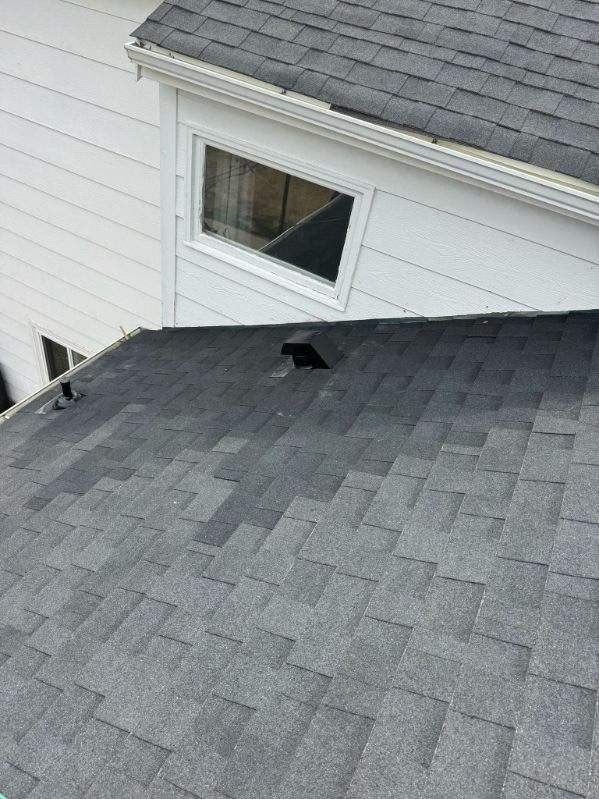 after shot once shingle tiles are repaired on roof