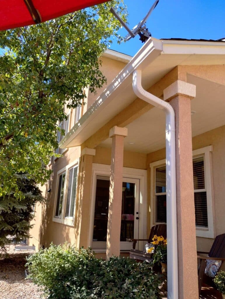 white gutters and downspouts on colorado home