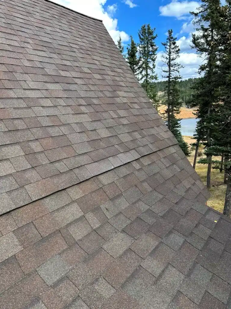 Vacation home architectural shingle roof repair completed in Divide, Colorado.